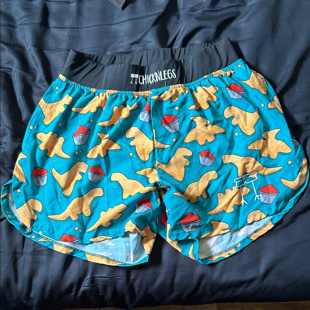 ChicknLegs Dinosaur Nuggets Print Shorts 4”